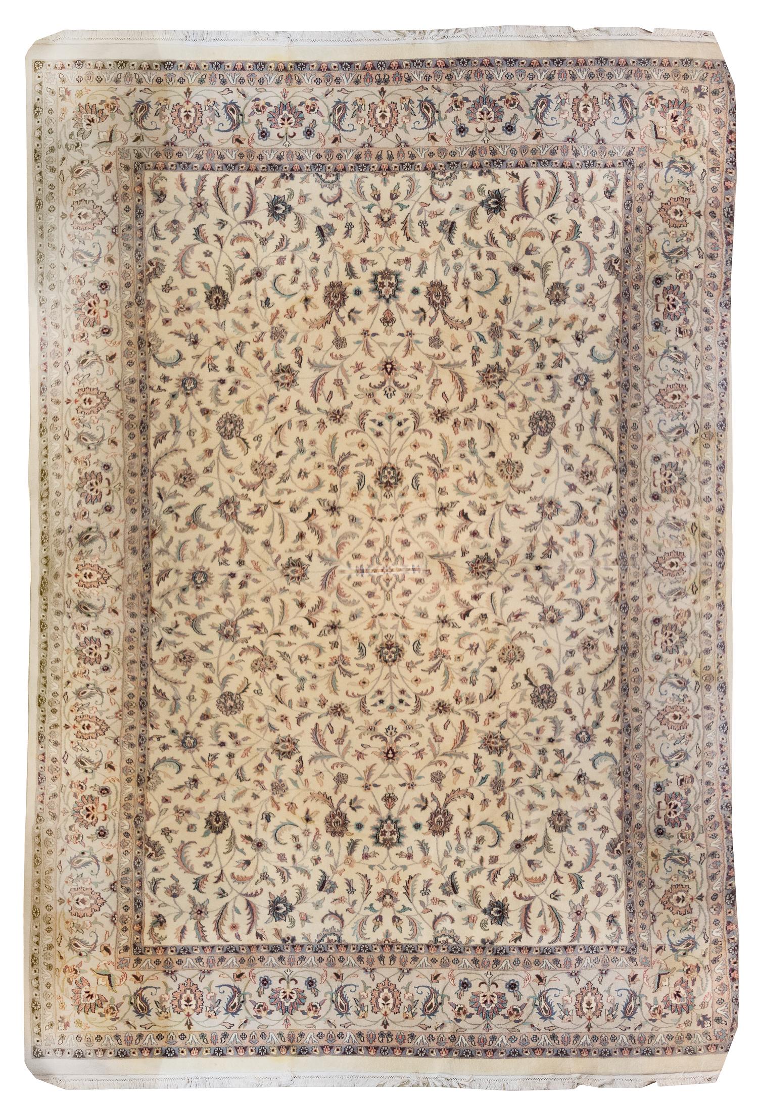 An Indo-Persian Wool Rug 17 feet x 11 feet