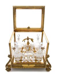 A French Gilt Bronze and Glass Cave a Liqueur Height 13 1/2 x width 17 x depth 14 1/2 inches. — LATE 19TH/EARLY 20TH CENTURY