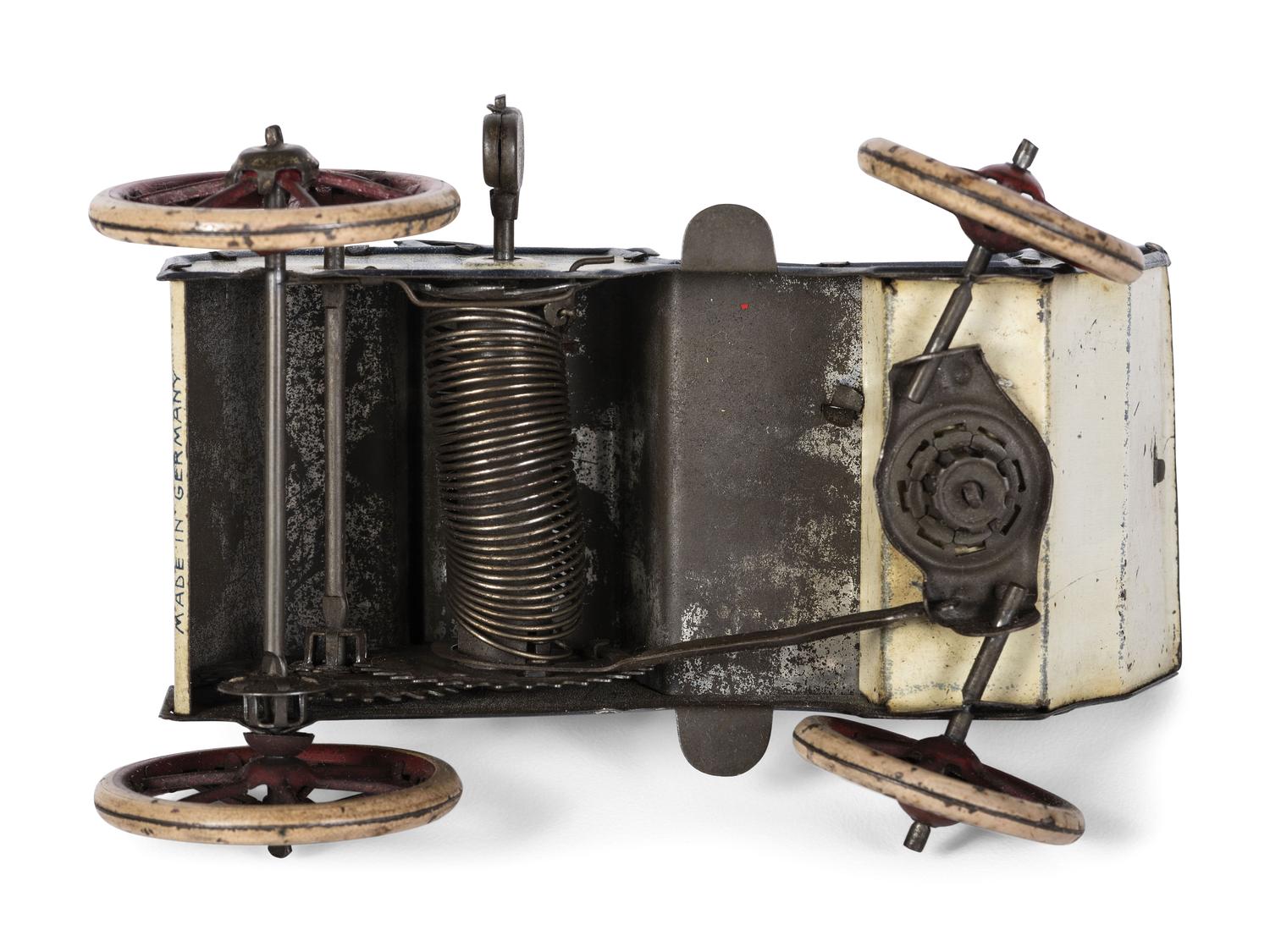 A Lehmann 'Naughty Boy' Tin Lithograph Windup Toy Car