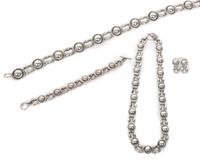 A James Reid, Ltd., Santa Fe, NM Sterling Silver Big Moon Suite Length of belt 41 1/2 inches.