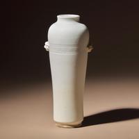 A Chinese Blanc-de-Chine Porcelain Sleeve Vase, 17th-18th Century — 清早期 德化白瓷雙輔首耳弦紋筒瓶
