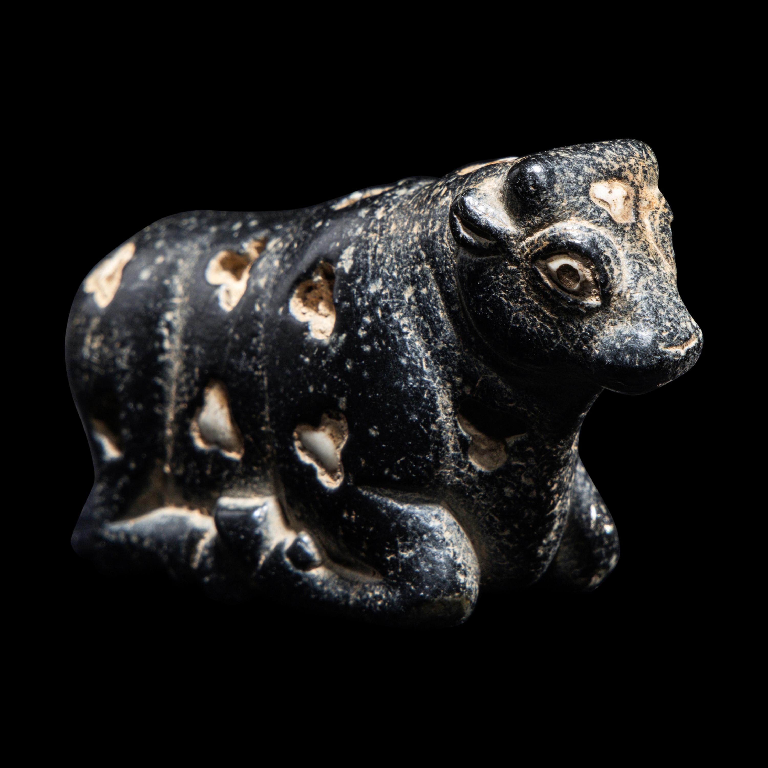A Mesopotamian Marble and Limestone Inlay Recumbent Calf
