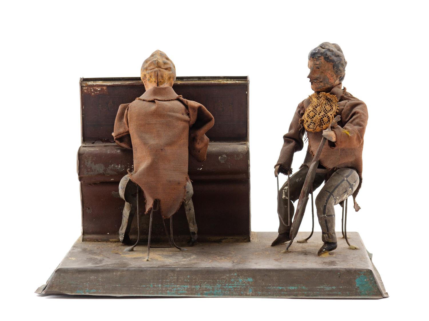 A Painted Tin Wind-Up "Two Musicians" Toy