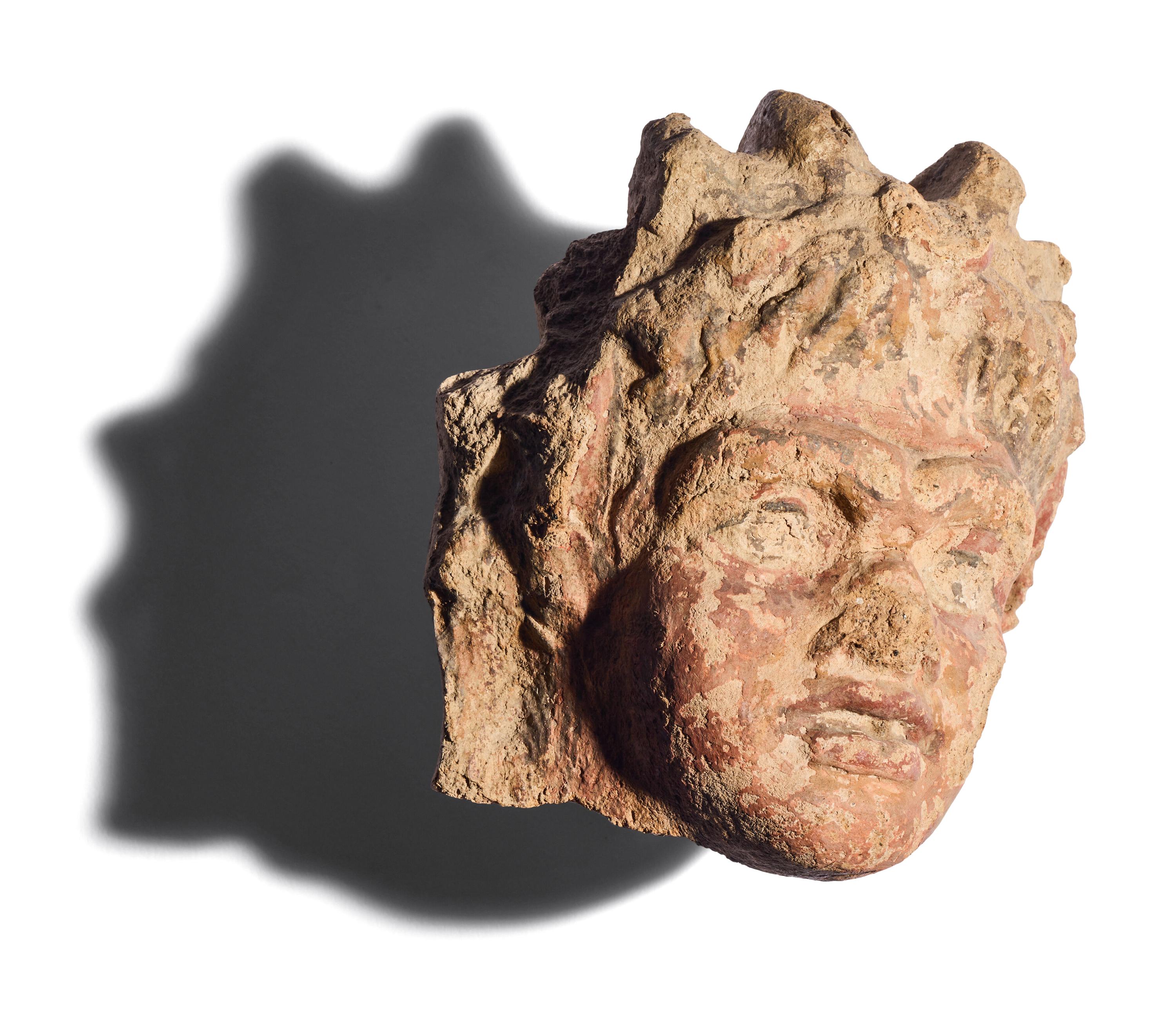 Two Etruscan Terracotta Antefix Fragments