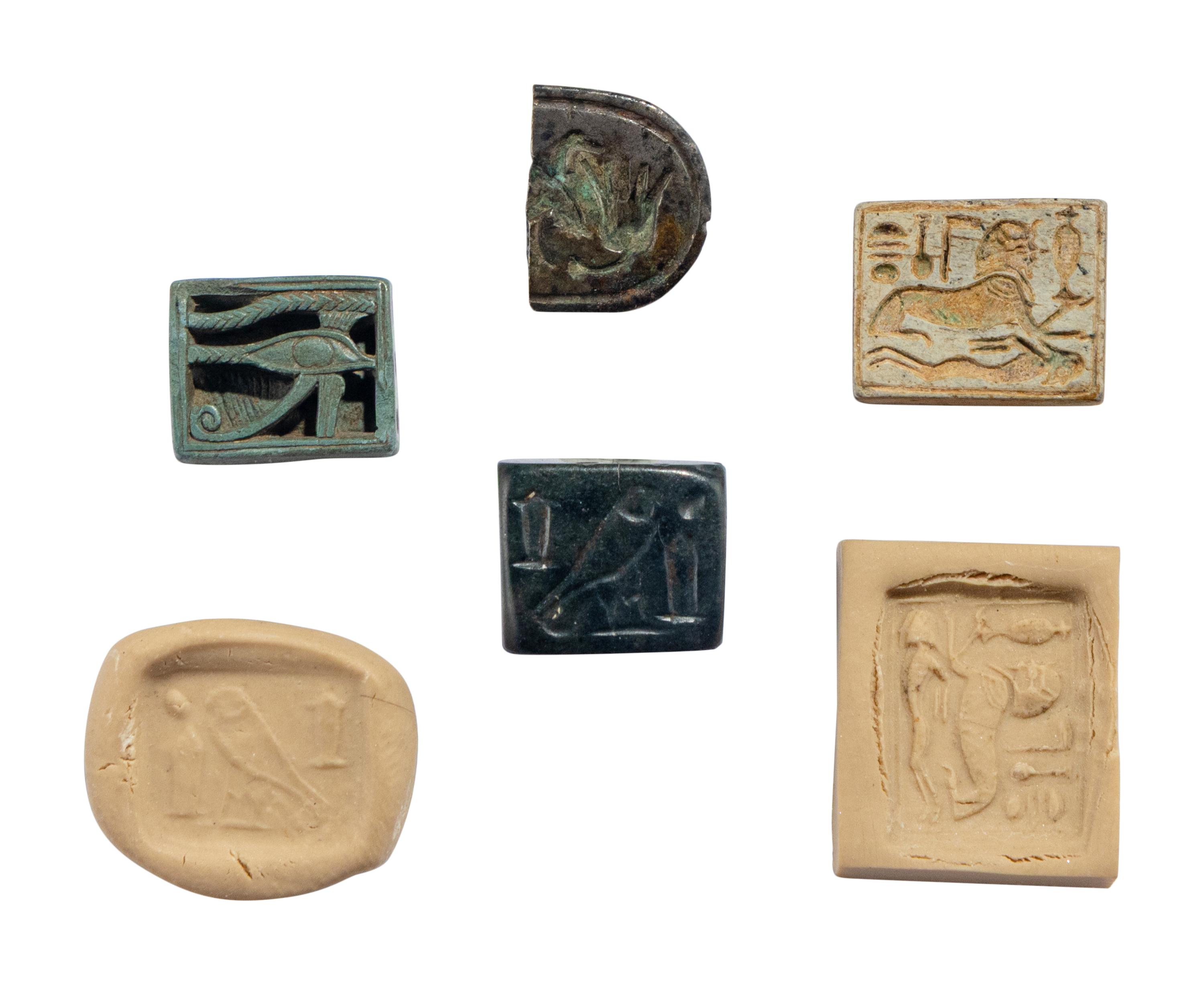 Four Egyptian Faience, Stone, and Metal Plaques with Hieroglyphs