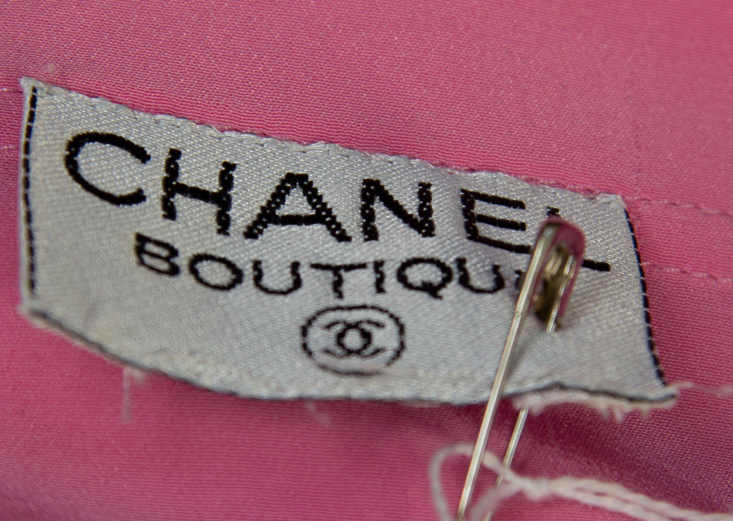 A Pair of Chanel Silk Short Sleeve Blouses,