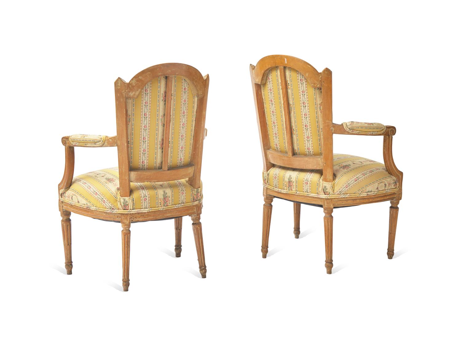 A Pair of Louis XVI Carved Fauteuils