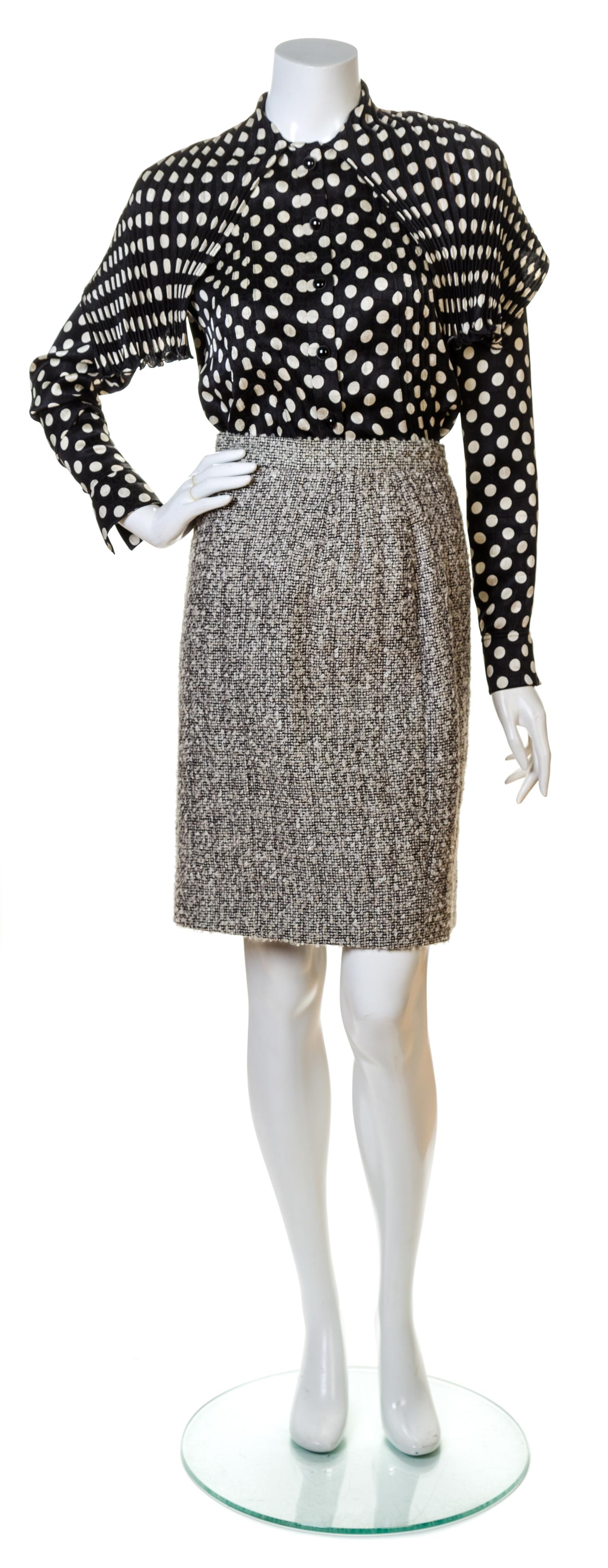 An Emanuel Ungaro Boucle Skirt Ensemble, Suit size 8, Blouse size 6.