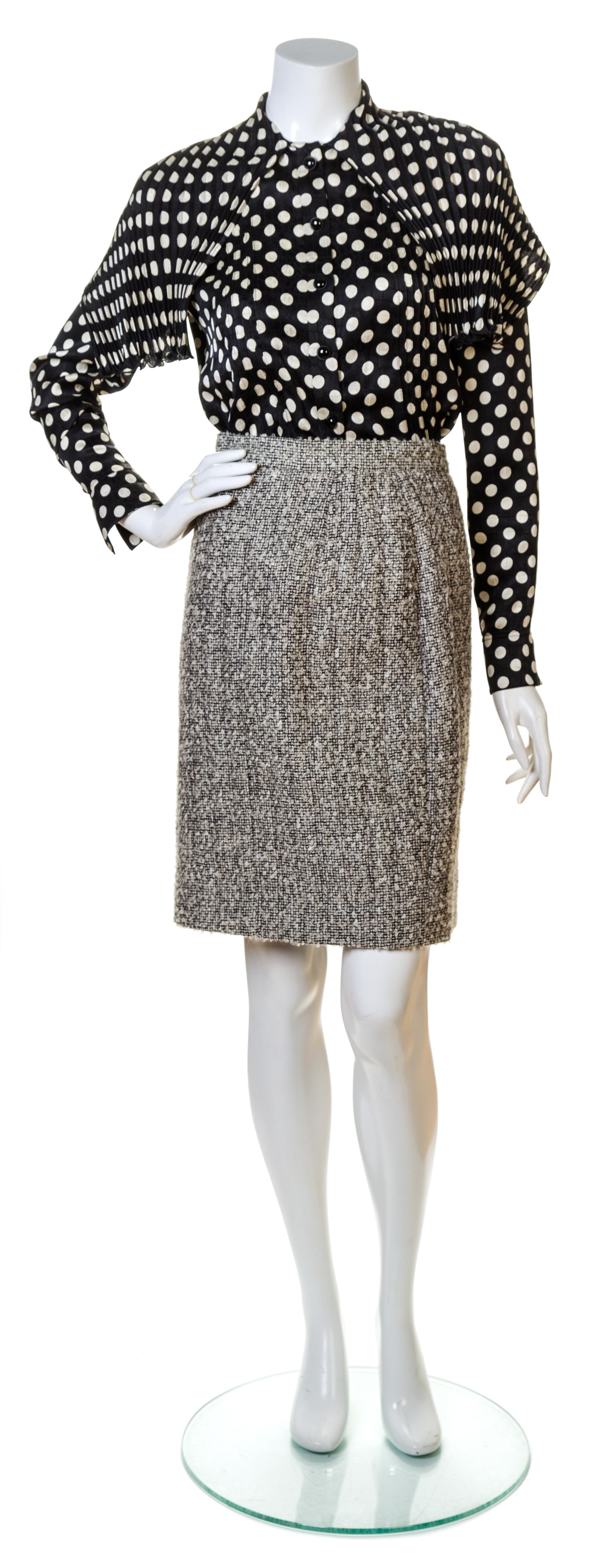 An Emanuel Ungaro Boucle Skirt Ensemble, Suit size 8, Blouse size 6.