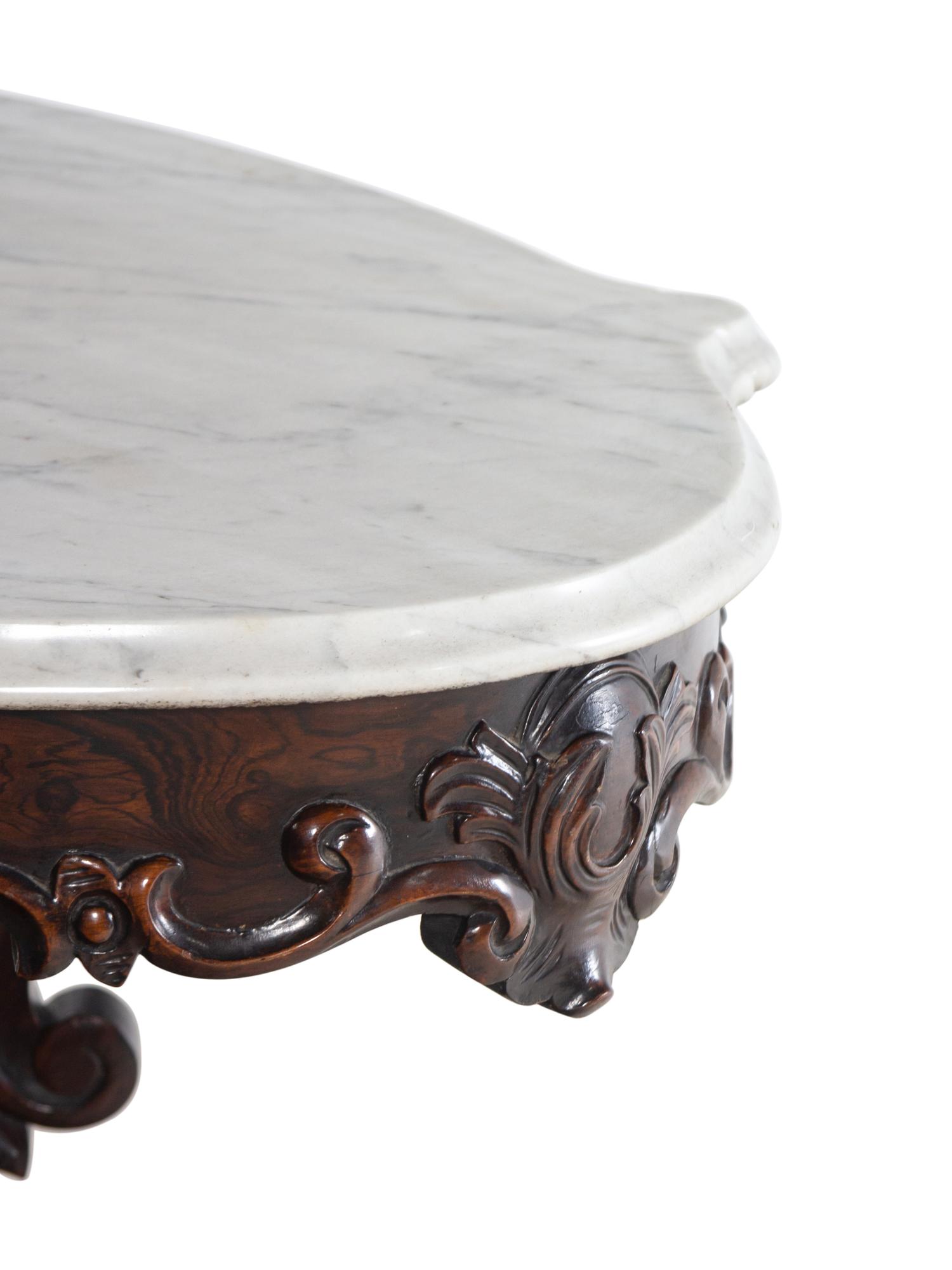 A Victorian Rococo Revival Rosewood Marble-Top Table