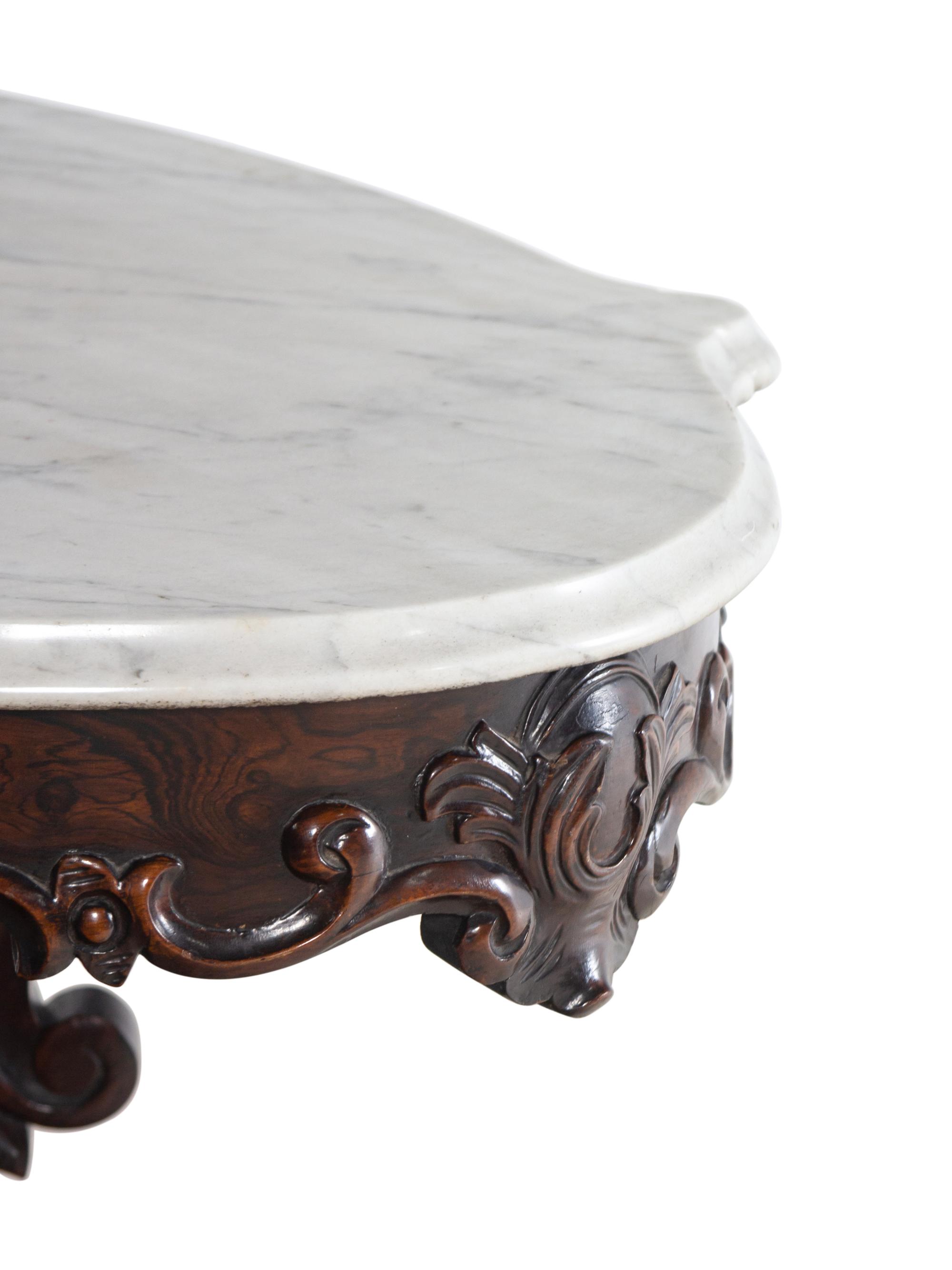 A Victorian Rococo Revival Rosewood Marble-Top Table