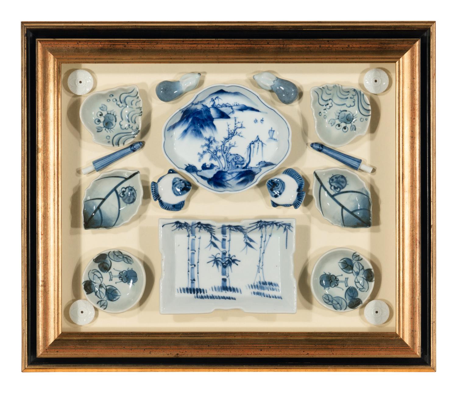 Four Shadow Boxes Mounted with Chinese Blue-and-White Porcelain Articles