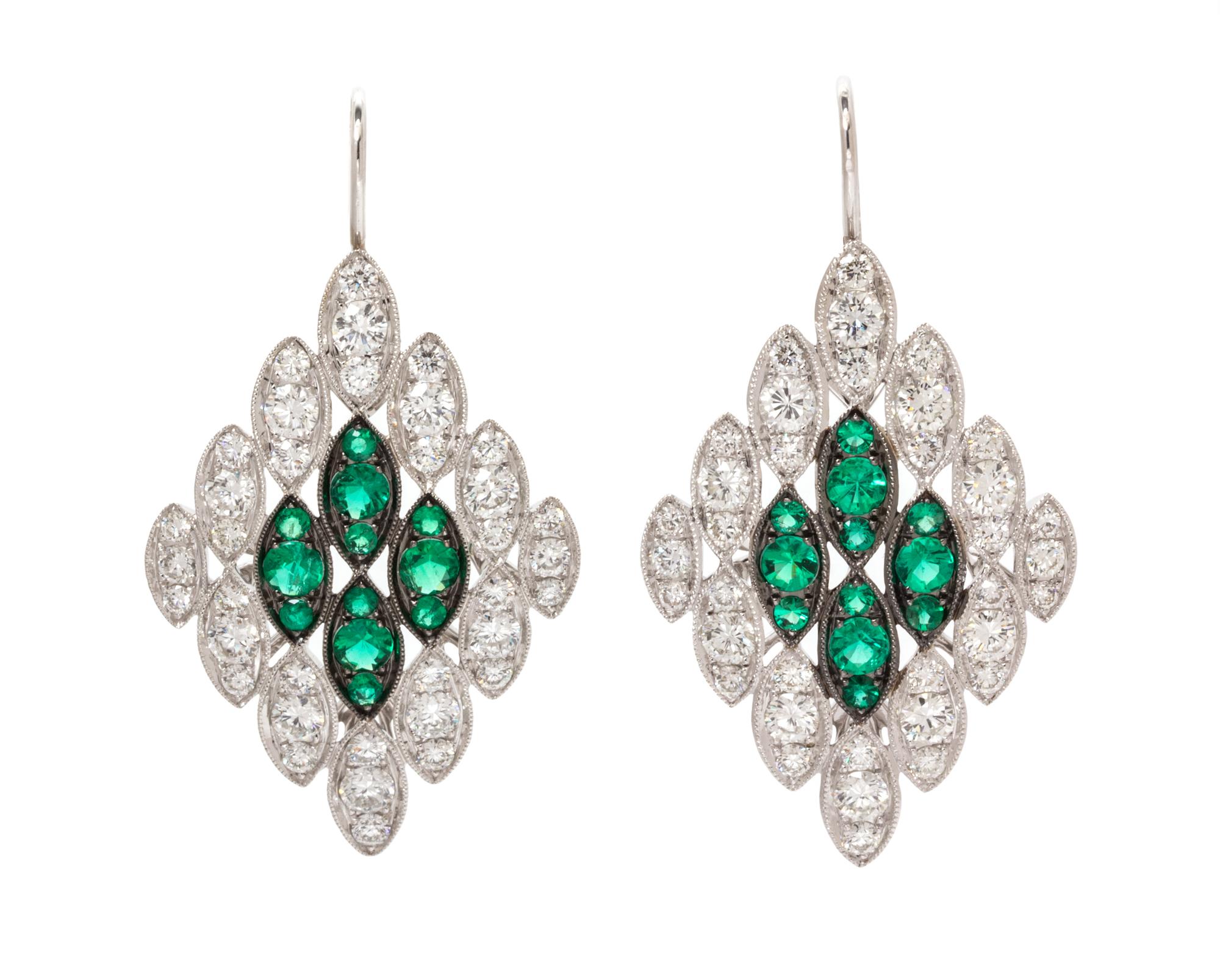 A Pair of 18 Karat White Gold, Diamond and Emerald Earrings, 7.65 dwts.