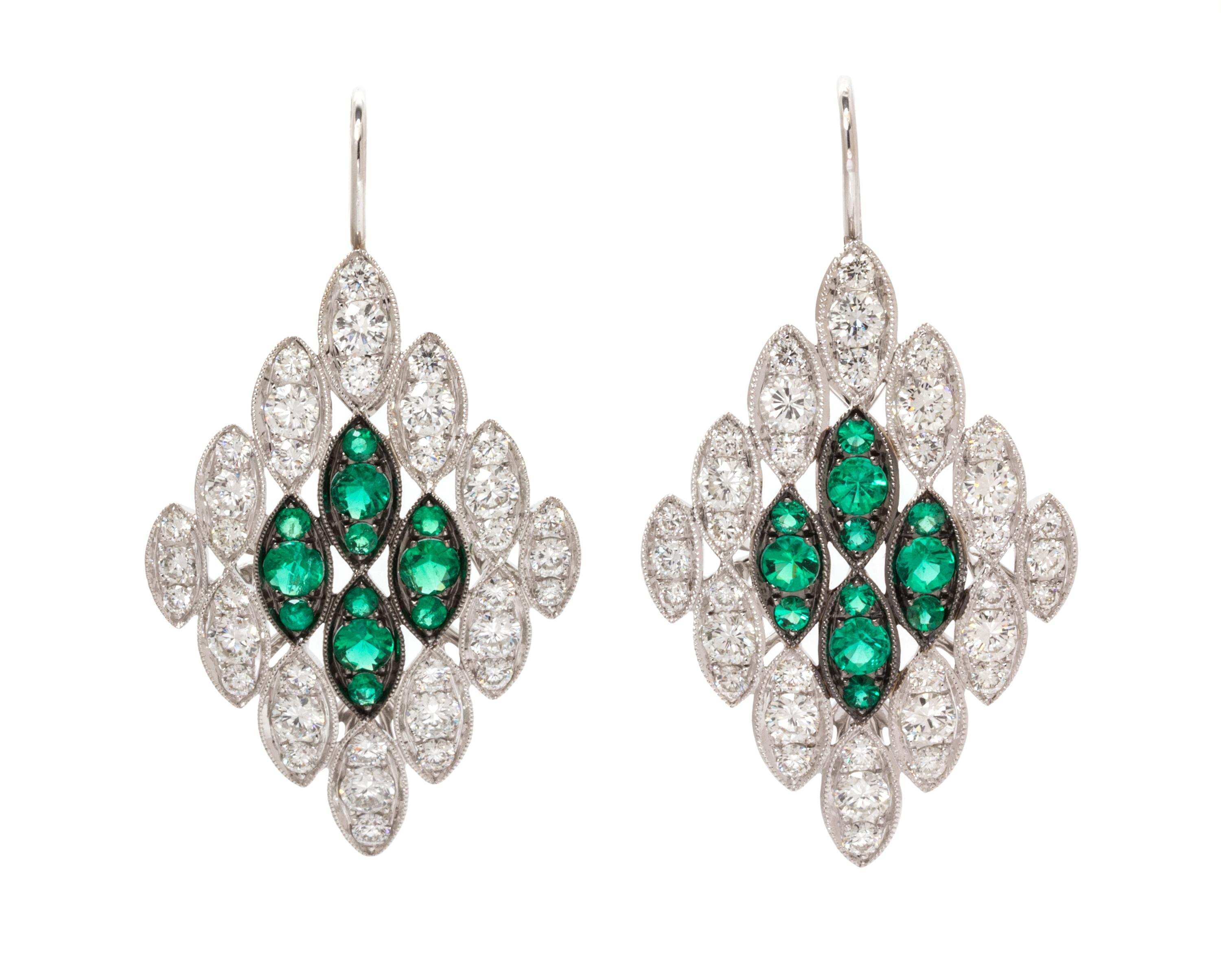 A Pair of 18 Karat White Gold, Diamond and Emerald Earrings, 7.65 dwts.