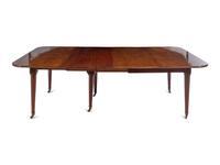 A Louis Philippe Walnut Dining Table