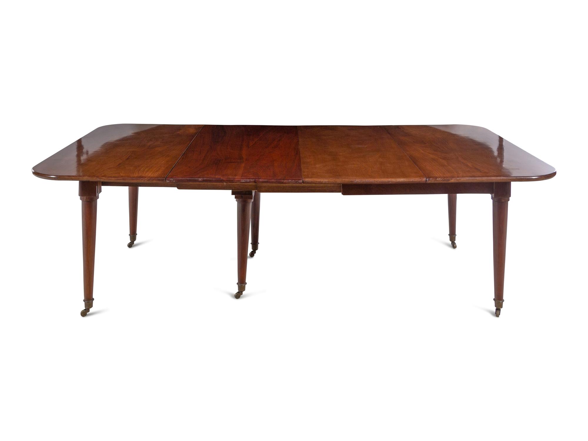 A Louis Philippe Walnut Dining Table