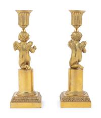 A Pair of Louis XVI Gilt Bronze Figural Candlesticks