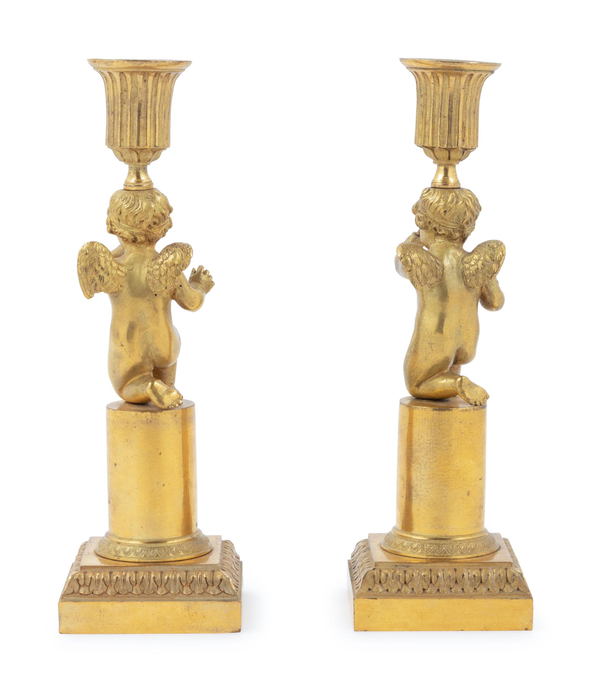 A Pair of Louis XVI Gilt Bronze Figural Candlesticks