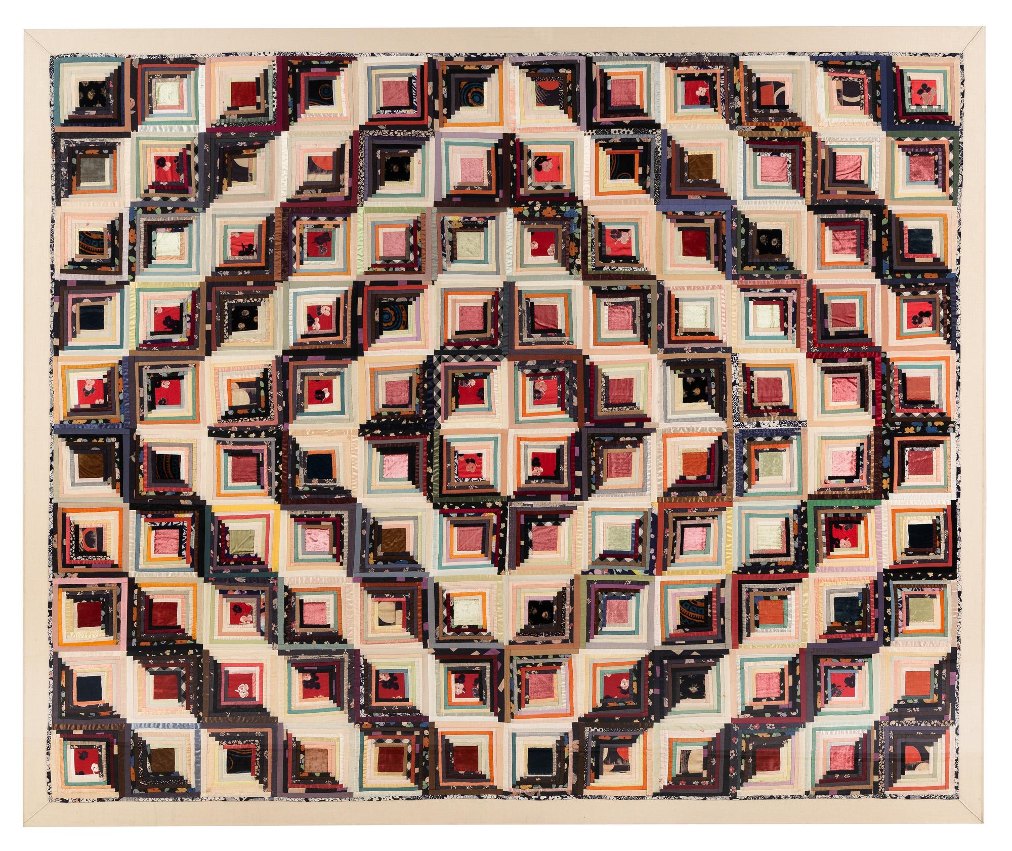 A Log Cabin Pattern Pieced Silk and Satin Quilt