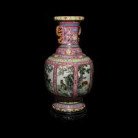 A Chinese Pink Sgraffito Ground Famille Rose Porcelain 'Dogs' Vase, Early-Mid 20th Century — 近現代 胭脂地軋道粉彩纏枝蓮紋開光獵犬圖雙耳瓶 帶木座