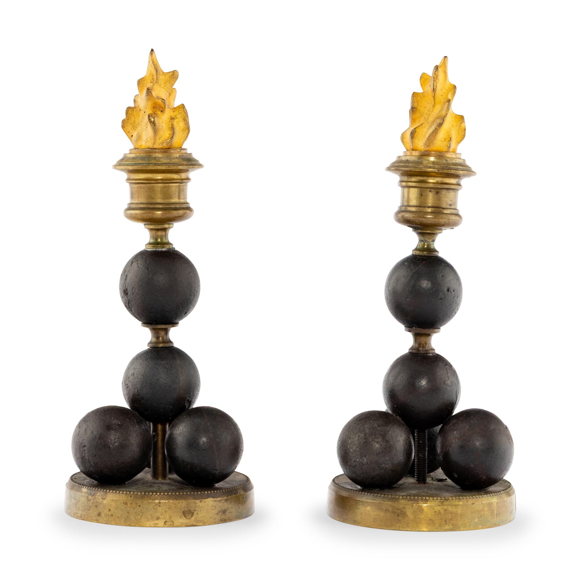 A Pair of French Gilt Bronze and Metal Candlesticks