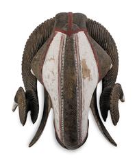 An African Carved and Painted Wood Ram's Head