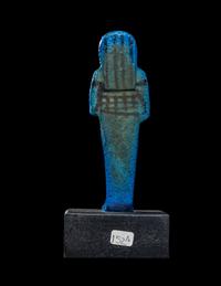 An Egyptian Blue Faience Ushabti for Tayuheret