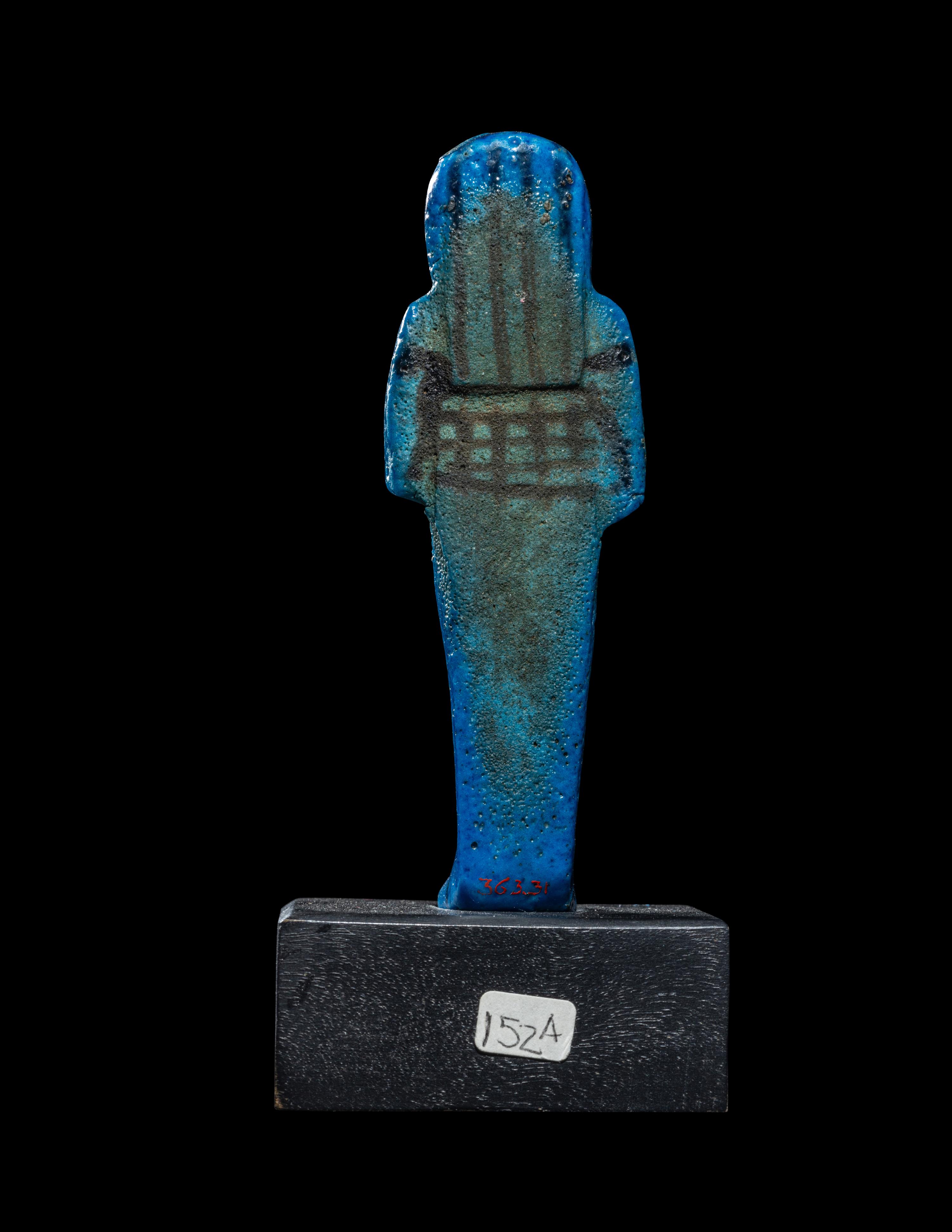 An Egyptian Blue Faience Ushabti for Tayuheret