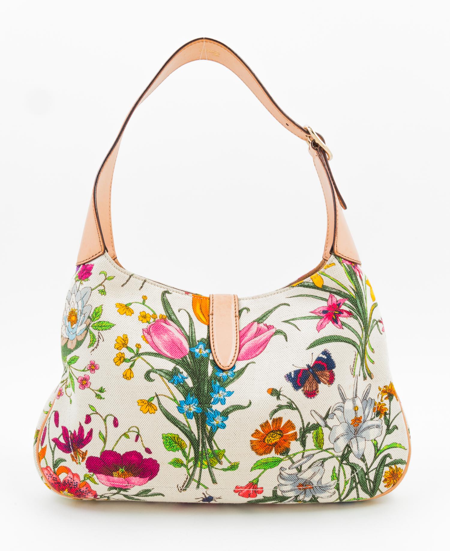 A Gucci Floral Canvas Handbag, 12" x 8" x 1.5"; Strap drop: 9".