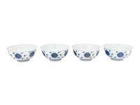 Four Chinese Blue and White Porcelain 'Lotus' Bowls