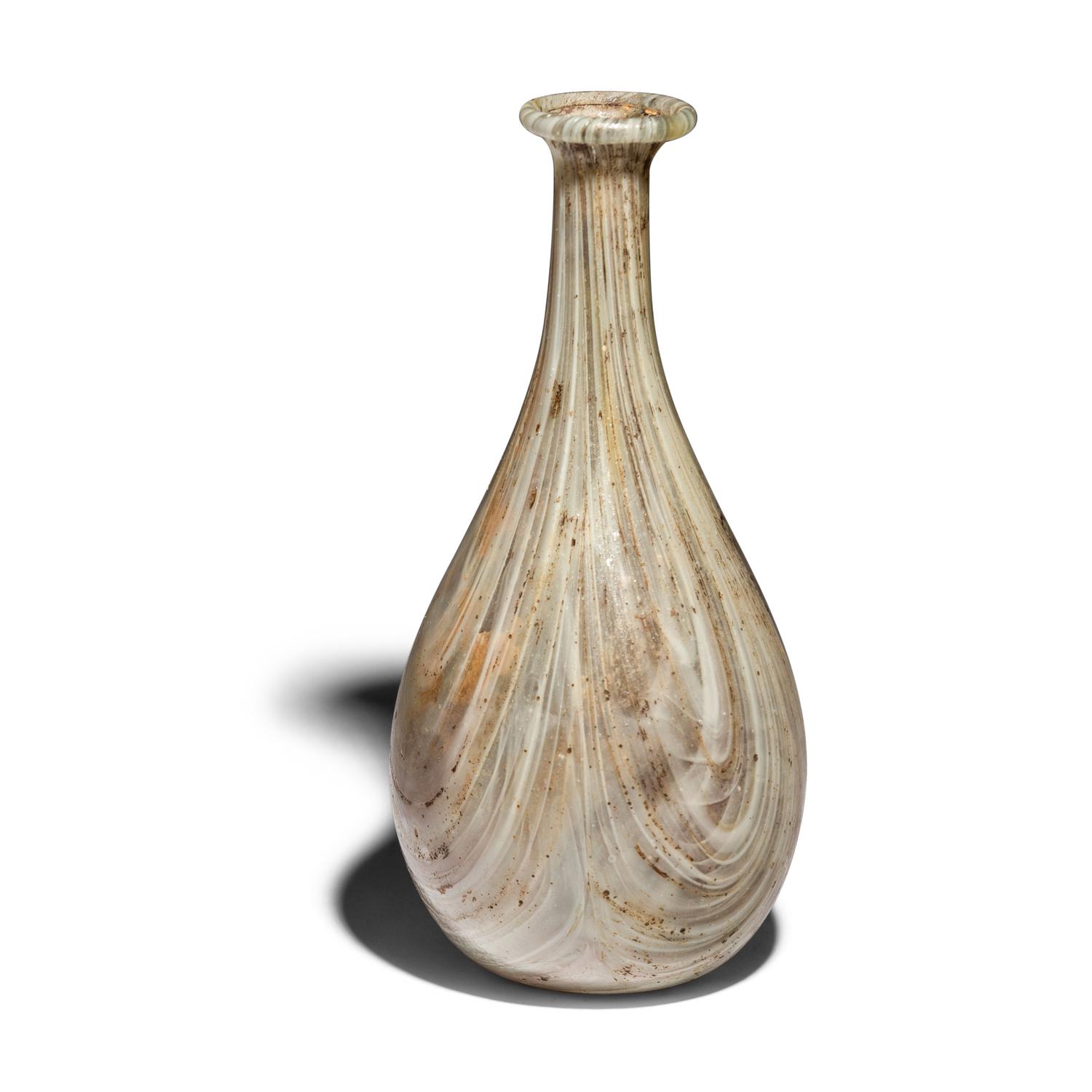 A Roman Marbled Pale Green and White Glass Bottle