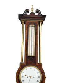 A Regency Crossbanded Mahogany Repeating Clock and Barometer