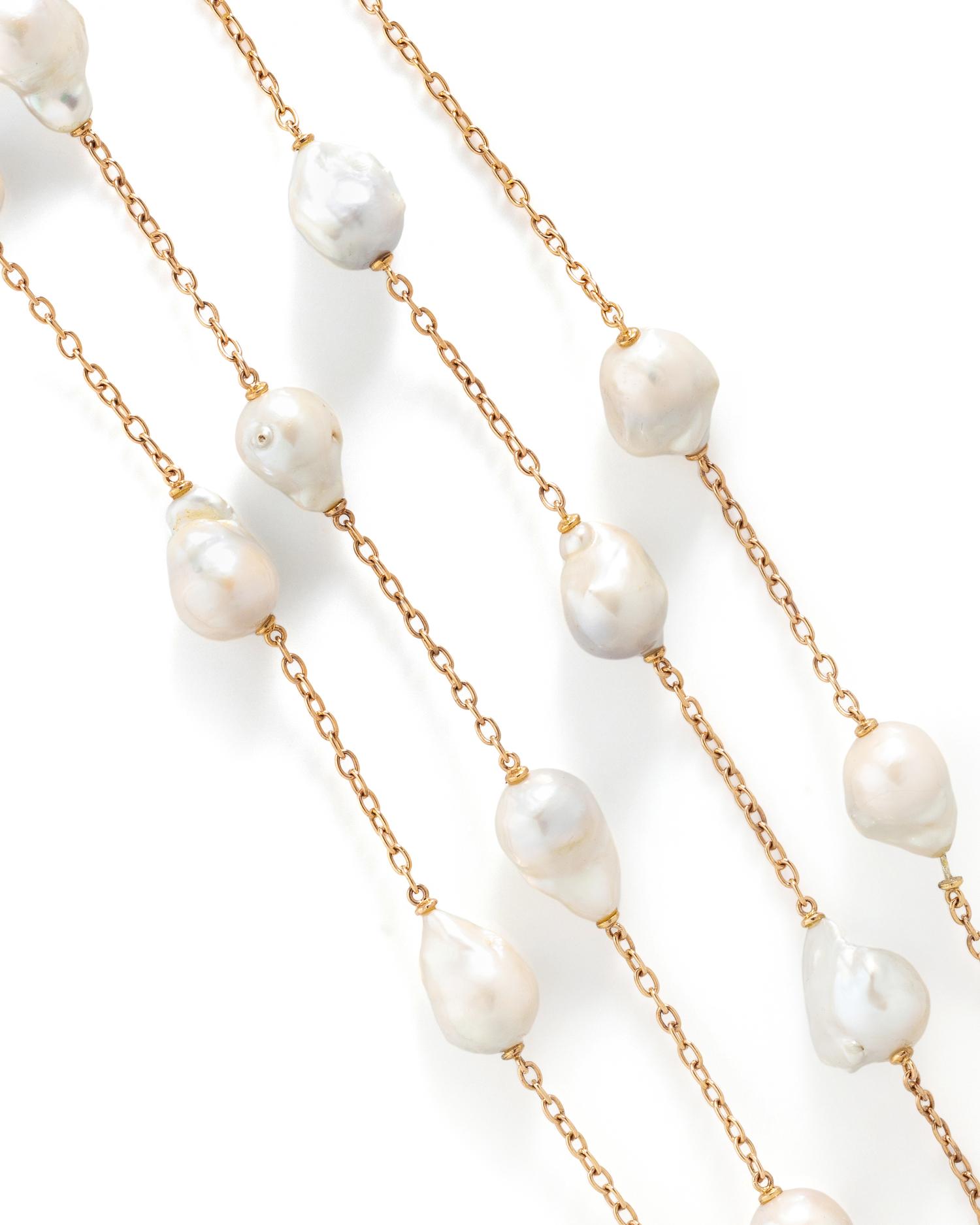 PAIR OF ROSE GOLD AND CULTURED BAROQUE PEARL LONGCHAIN NECKLACES