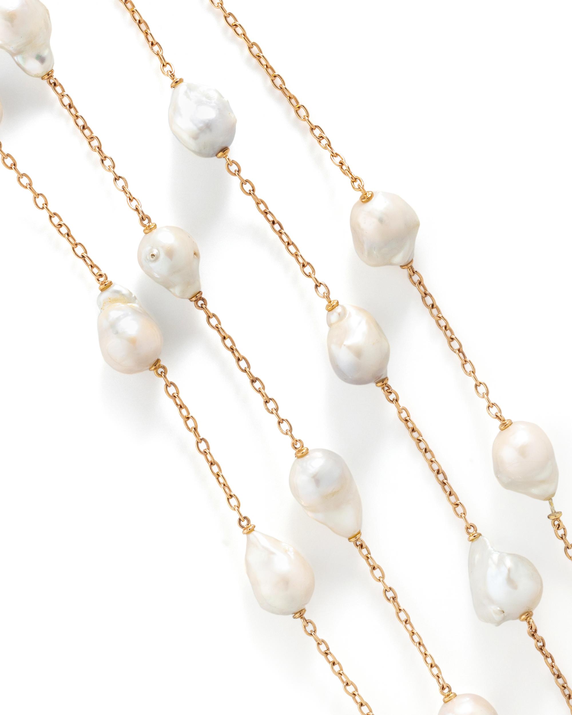 PAIR OF ROSE GOLD AND CULTURED BAROQUE PEARL LONGCHAIN NECKLACES
