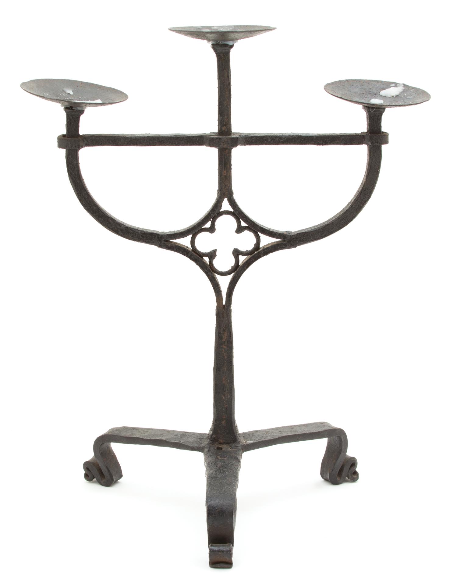 A Gothic Revival Wrought Iron Three-Light Candelabra Height 18 inches. — 19TH CENTURY