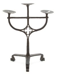 A Gothic Revival Wrought Iron Three-Light Candelabra Height 18 inches. — 19TH CENTURY