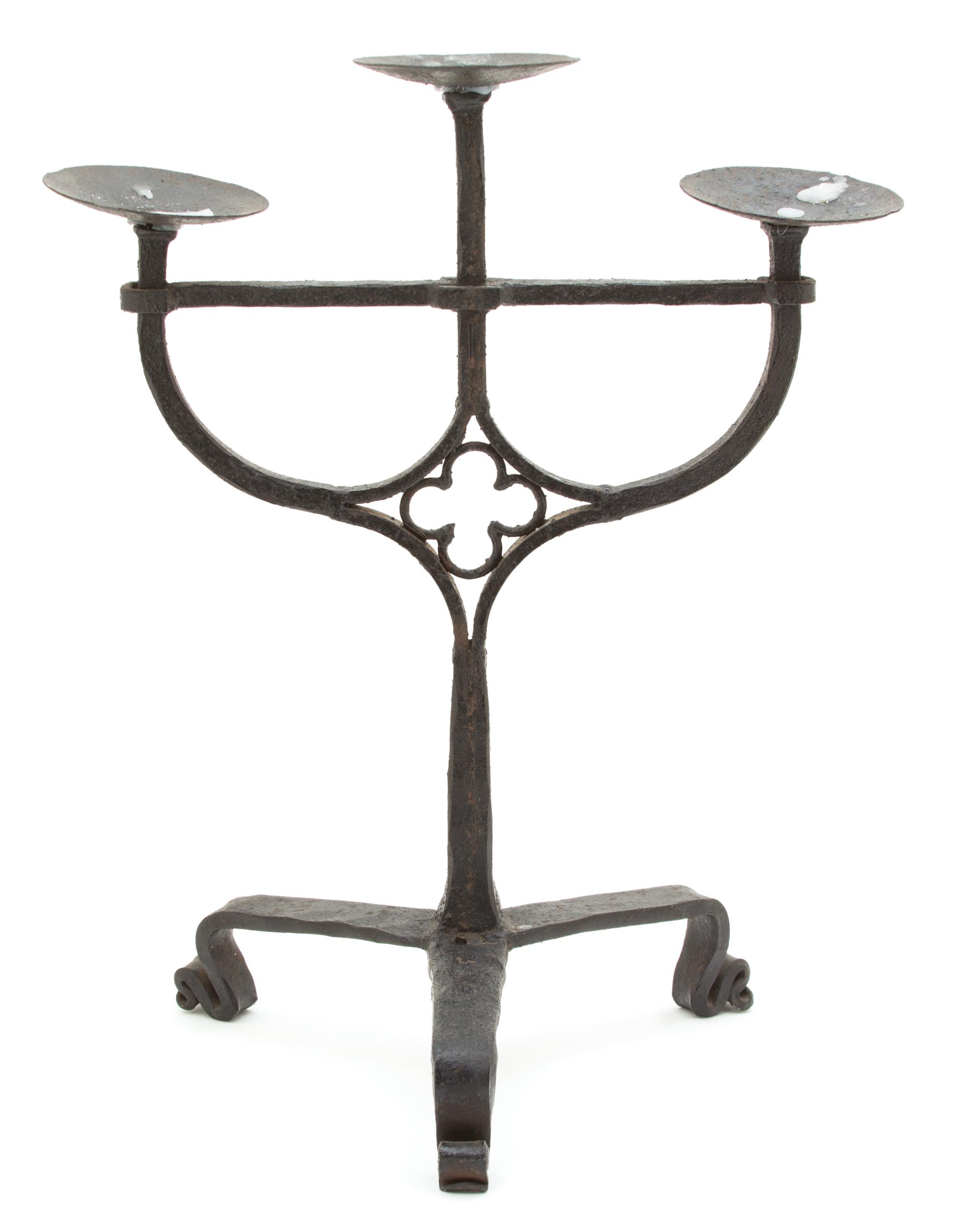 A Gothic Revival Wrought Iron Three-Light Candelabra Height 18 inches. — 19TH CENTURY