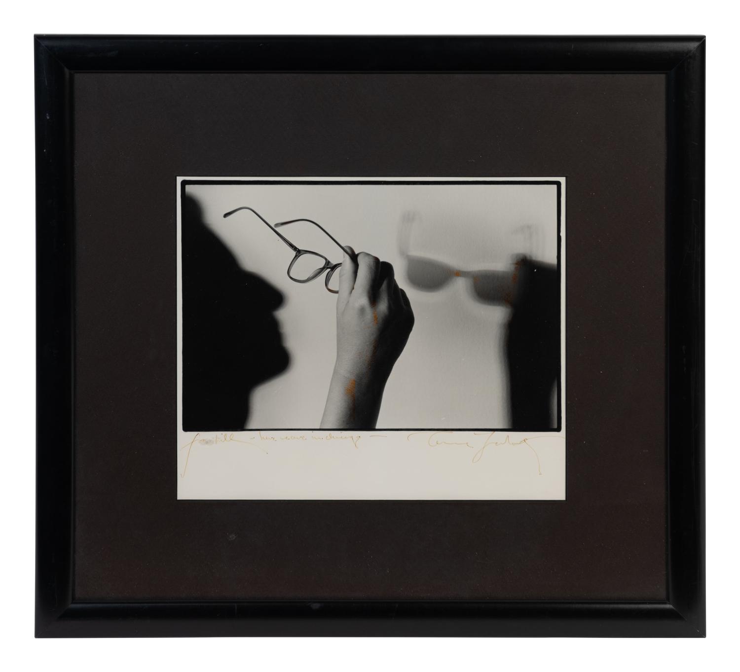 (Celebrity Ephemera) LEIBOWITZ, Annie (1949). Portrait of the artist’s glasses and shadow in profile.