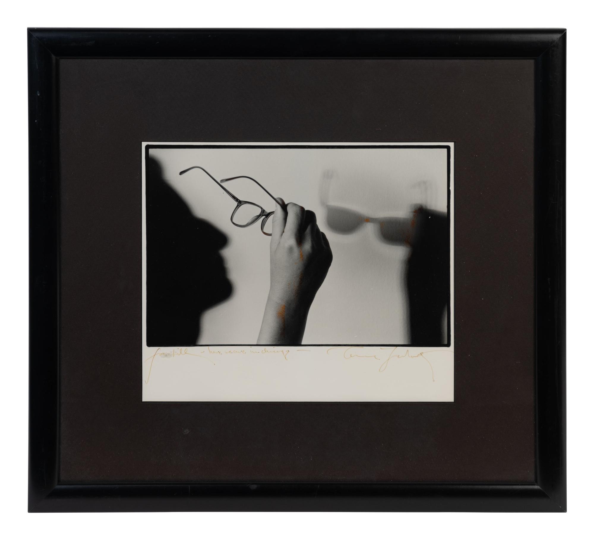 (Celebrity Ephemera) LEIBOWITZ, Annie (1949). Portrait of the artist’s glasses and shadow in profile.