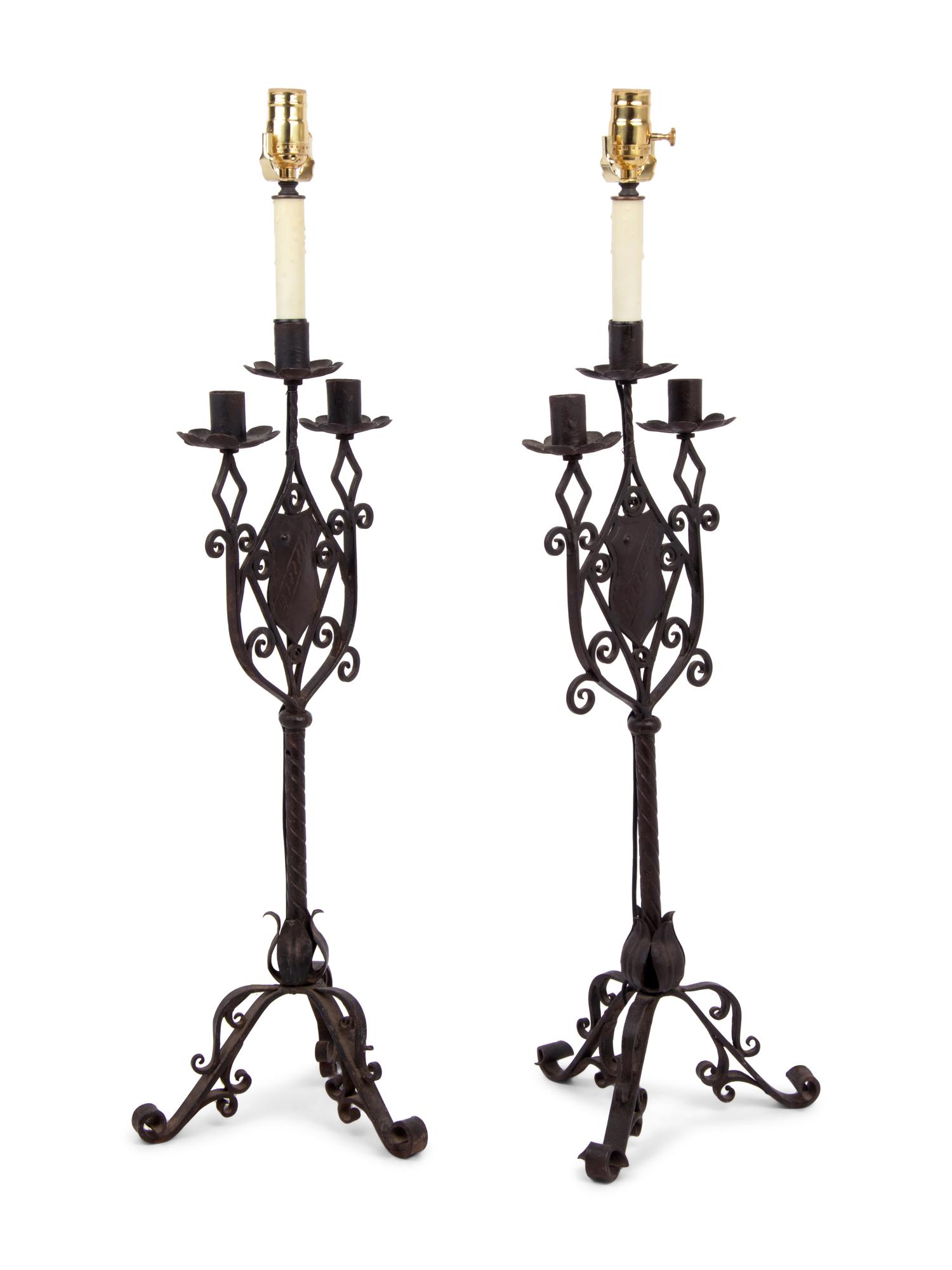 A Pair of Continental Iron Three-Light Candelabra Mounted as Lamps