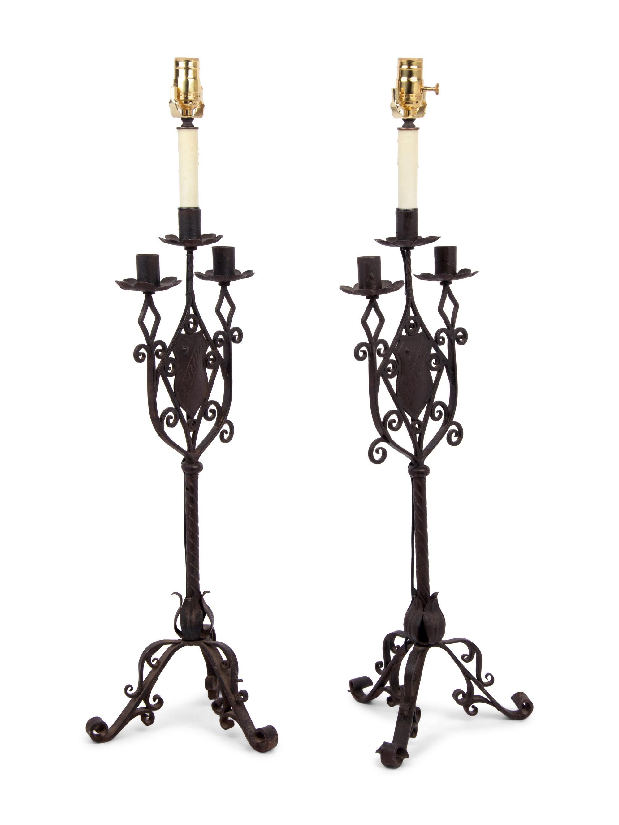 A Pair of Continental Iron Three-Light Candelabra Mounted as Lamps