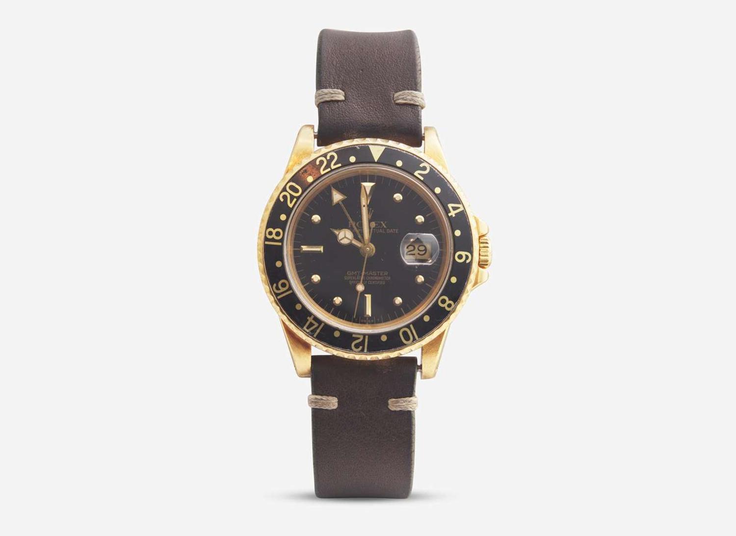 A Men's 18K Yellow Gold Rolex GMT Master