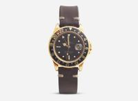 A Men's 18K Yellow Gold Rolex GMT Master