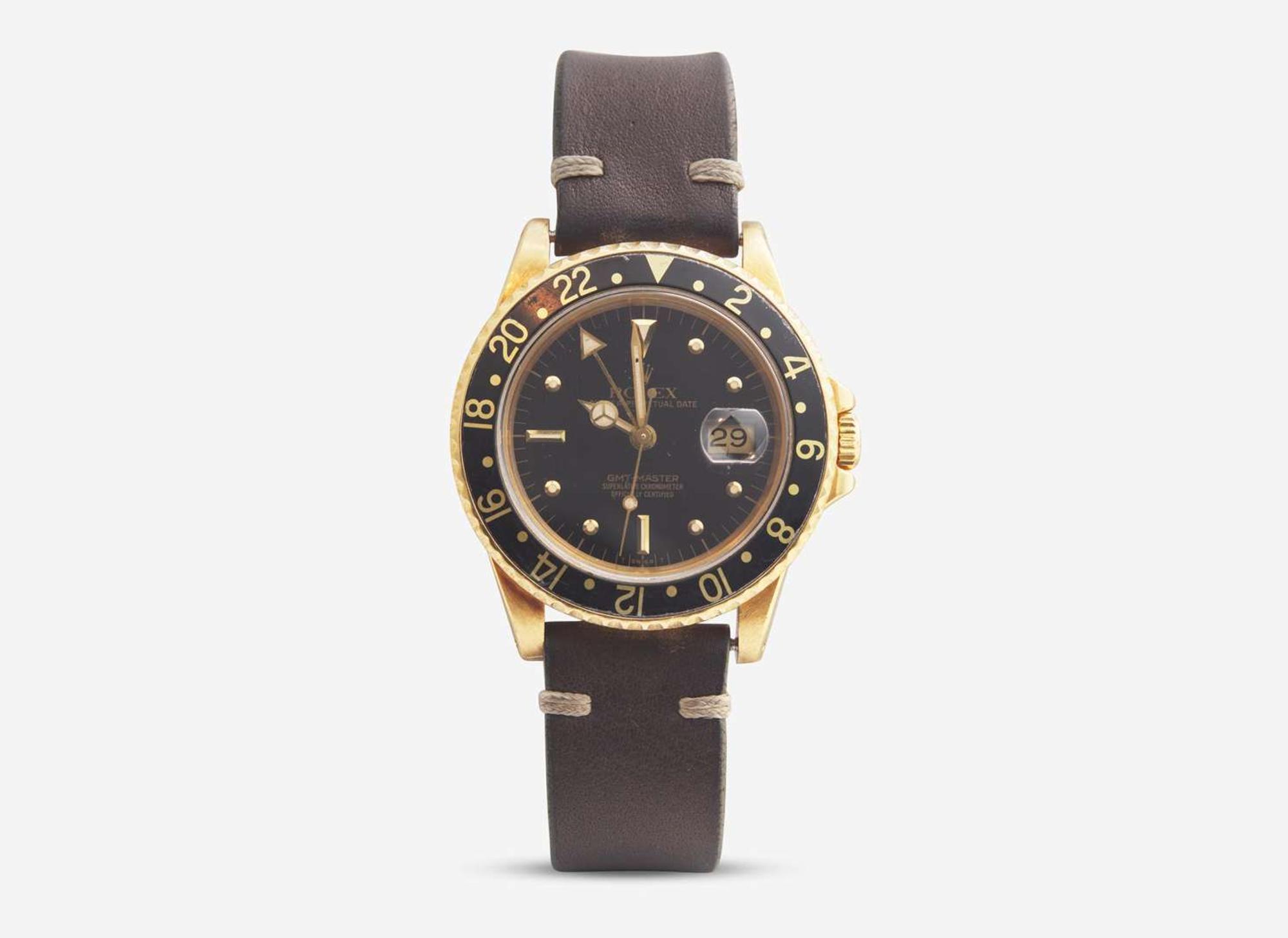 A Men's 18K Yellow Gold Rolex GMT Master