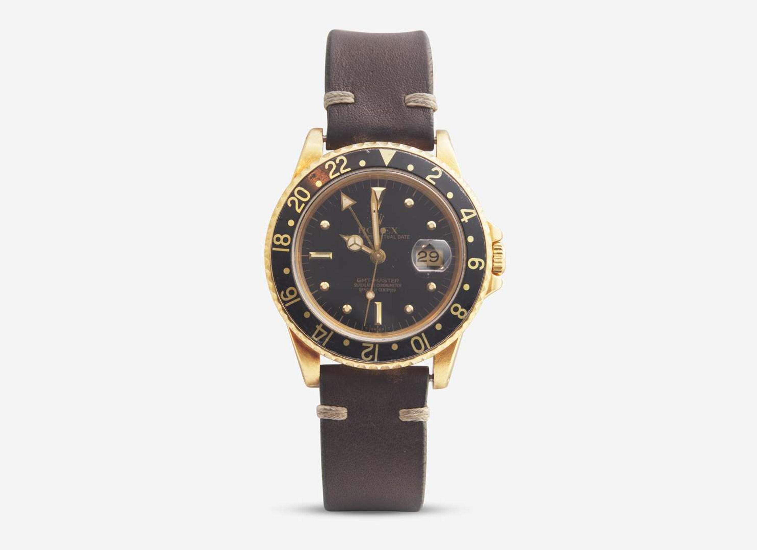 A Men's 18K Yellow Gold Rolex GMT Master