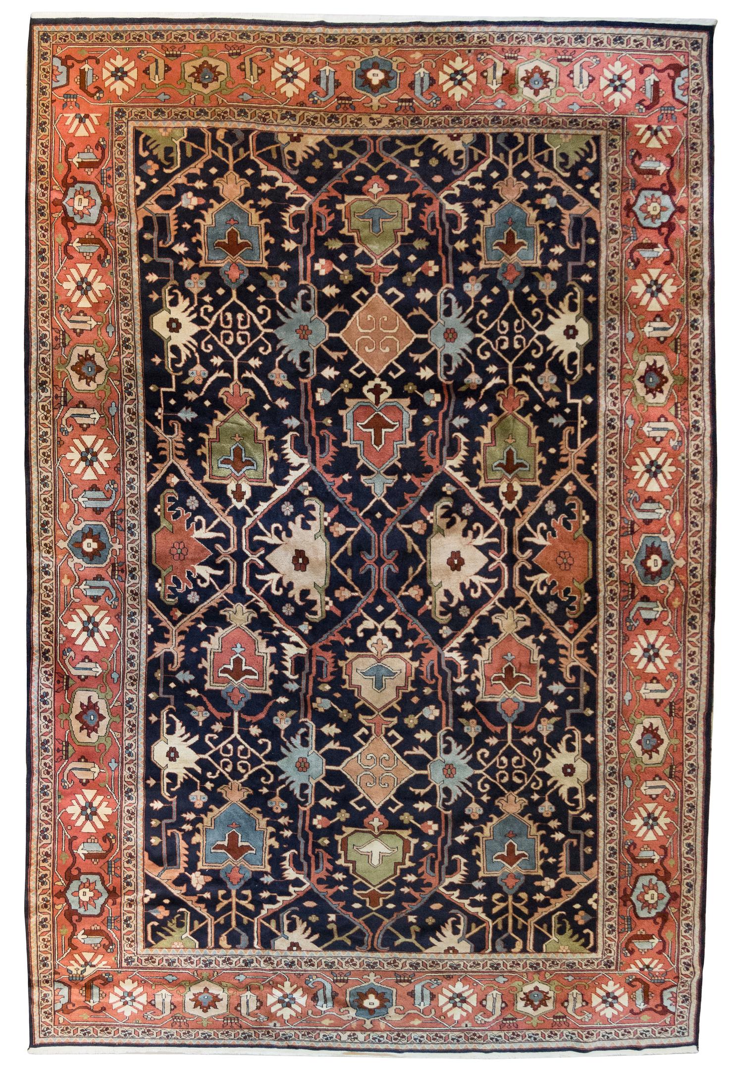 A Persian Wool Rug 13 feet 10 inches x 10 feet.