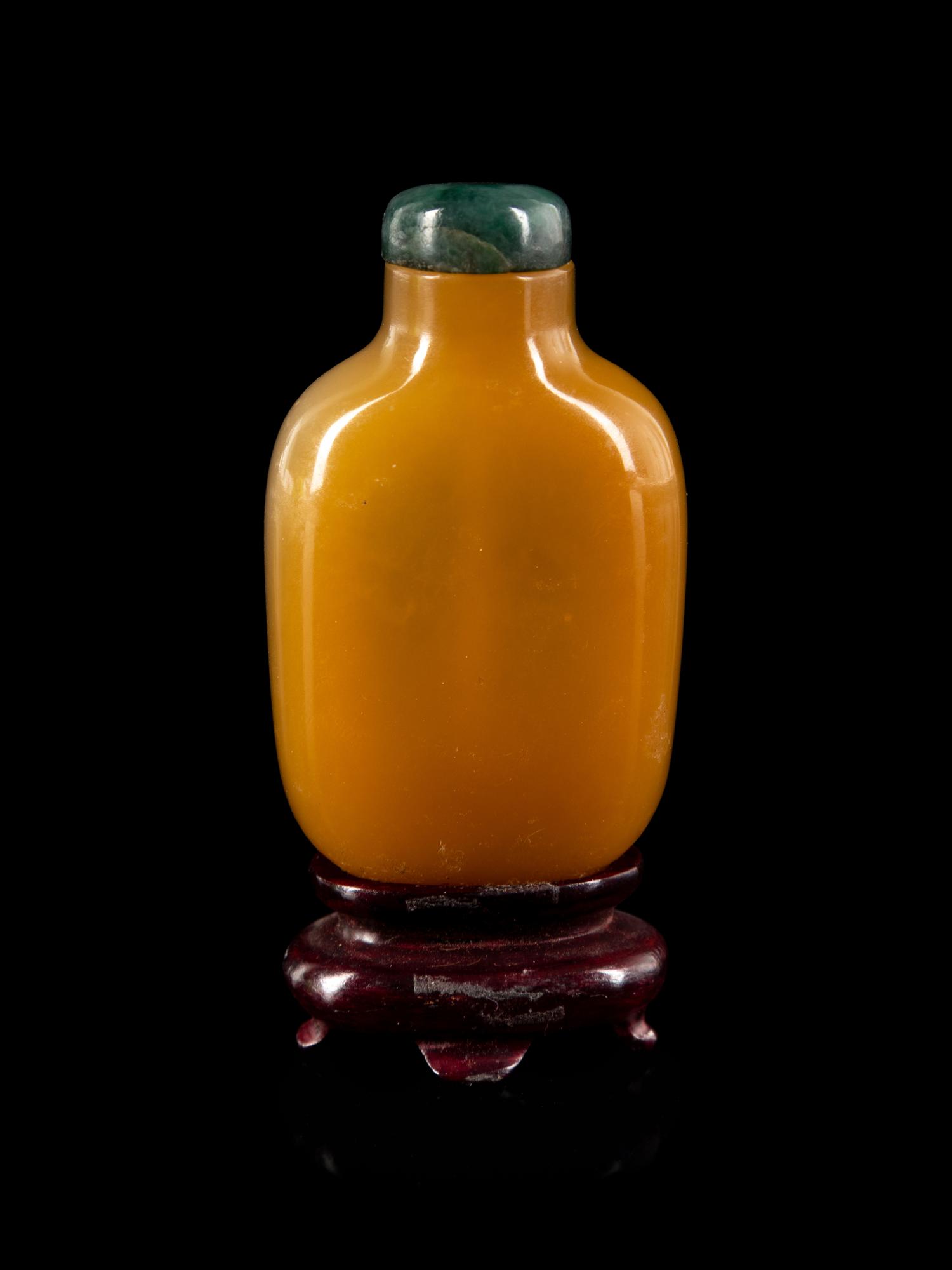 A Chinese Yellow Agate Snuff Bottle