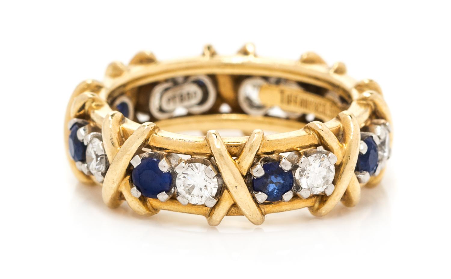 An 18 Karat Yellow Gold, Platinum, Sapphire and Diamond "Sixteen Stone" Band, Jean Schlumberger for Tiffany & Co., 4.90 dwts.