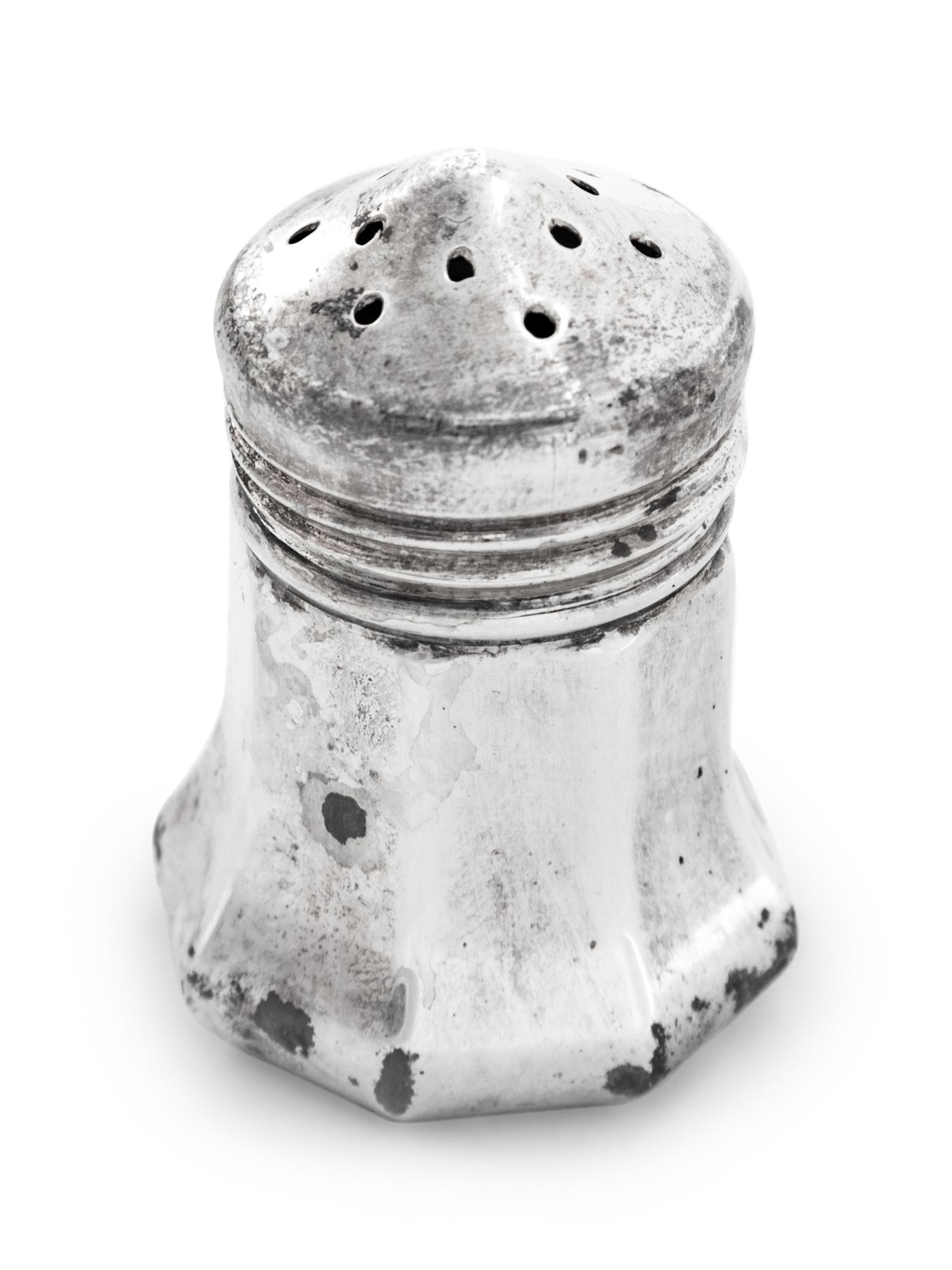 A Set of Sixteen Cartier Silver Casters