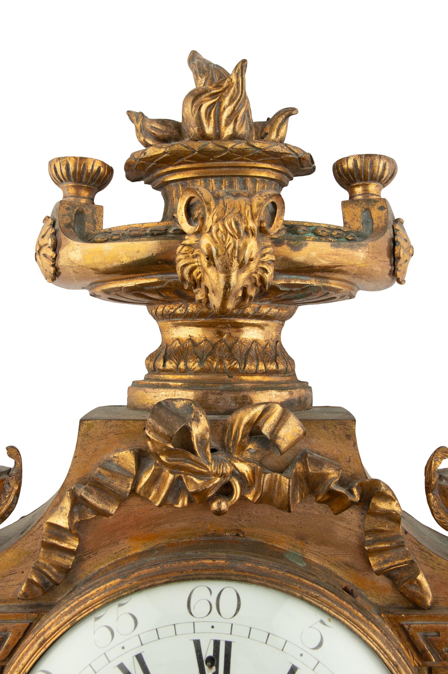 A Louis XVI Style Gilt Bronze Cartel Clock